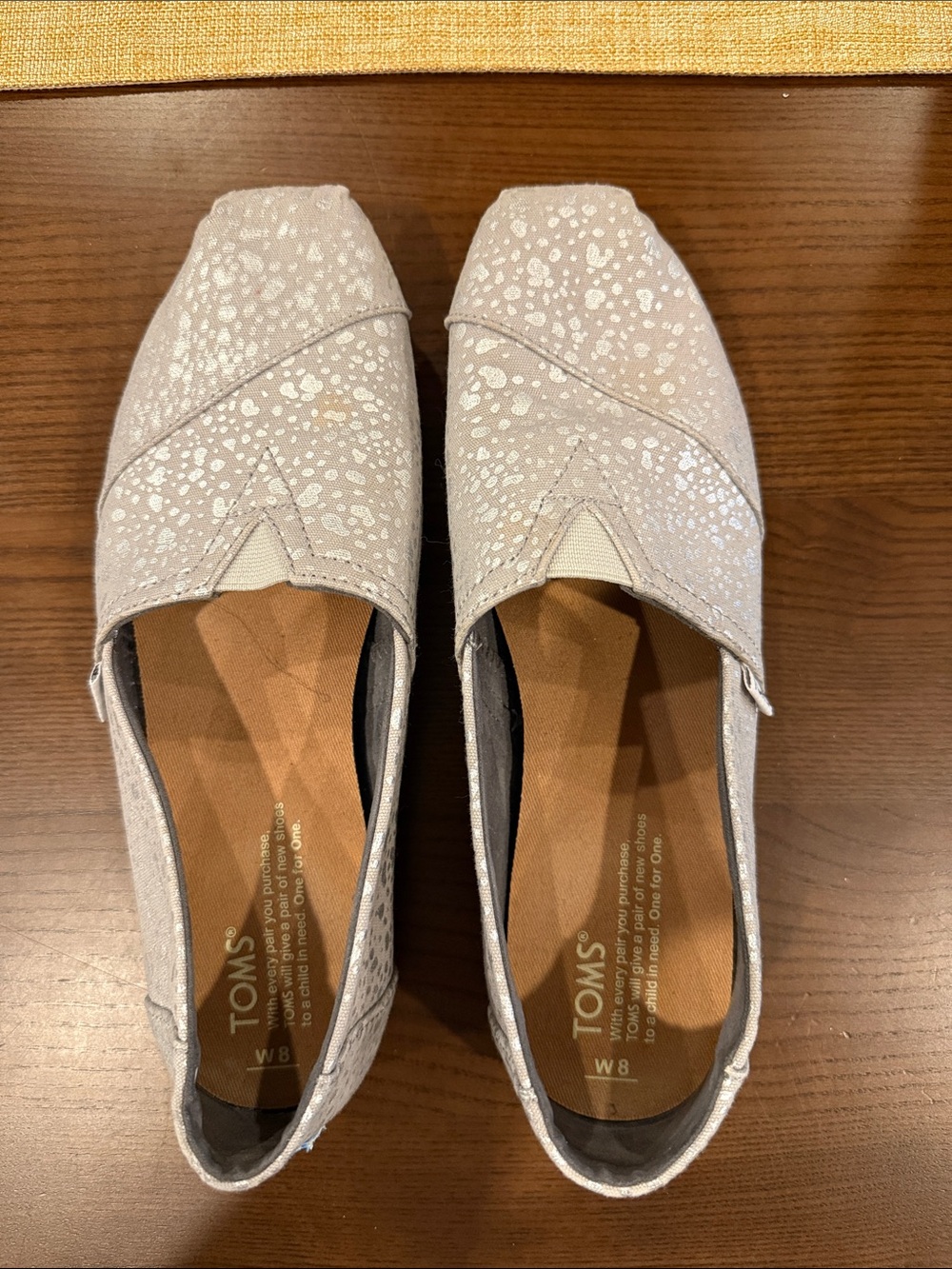 TOMS Women's Light Silver Metallic Slip-On Flats